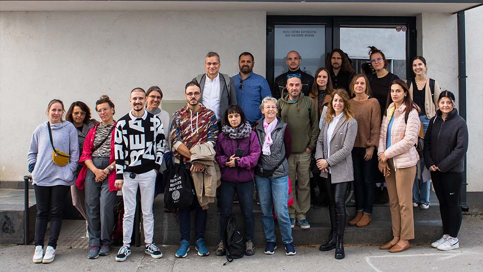 Conference participants in front of the entrance of the War Childhood Museum in Sarajevo.
